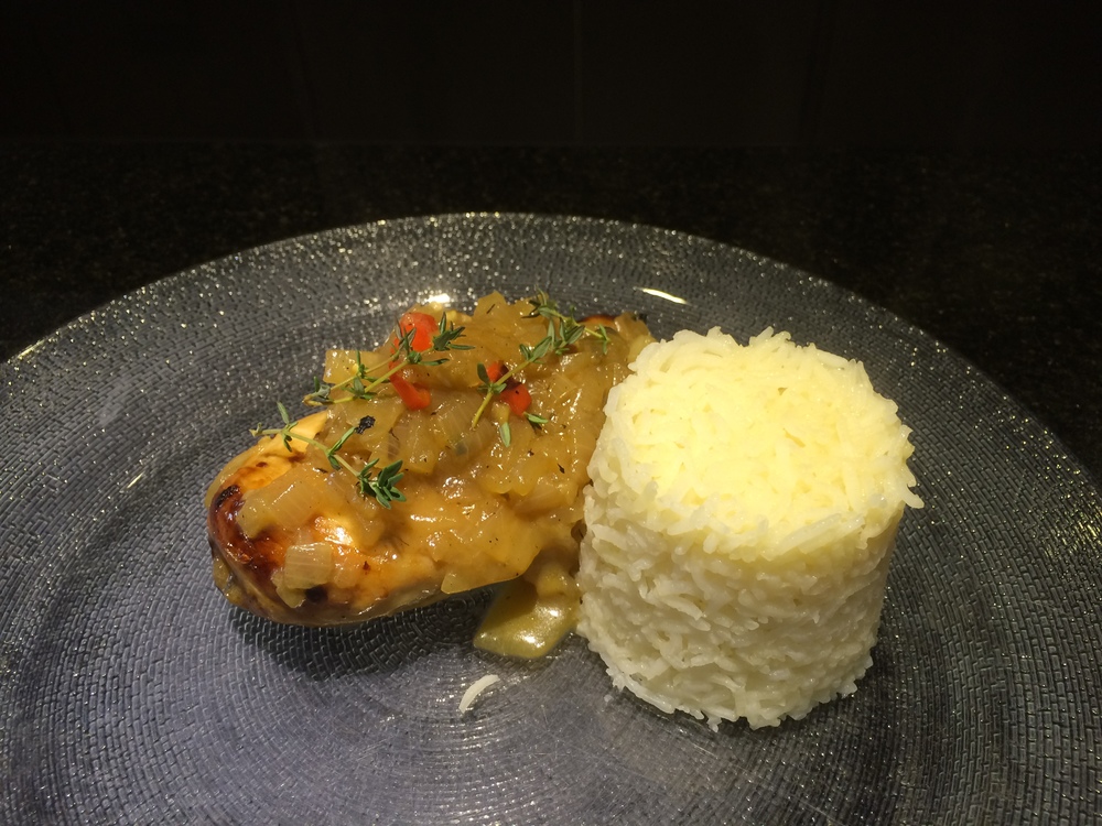 Poulet Yassa is one of Senegals most popular dishes which features lemon-marinated grilled chicken simmered in a spicy onion sauce.