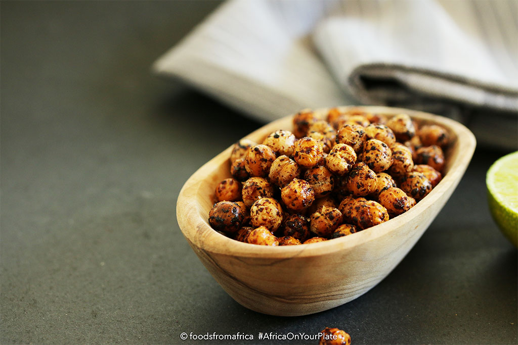 These Oven-roasted Chickpeas are the ultimate healthy snack - black-speckled golden and crispy balls with a buttery interior and a spicy kick