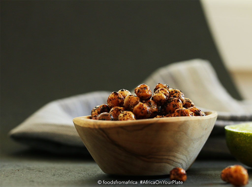 These Oven-roasted Chickpeas are the ultimate healthy snack - black-speckled golden and crispy balls with a buttery interior and a spicy kick
