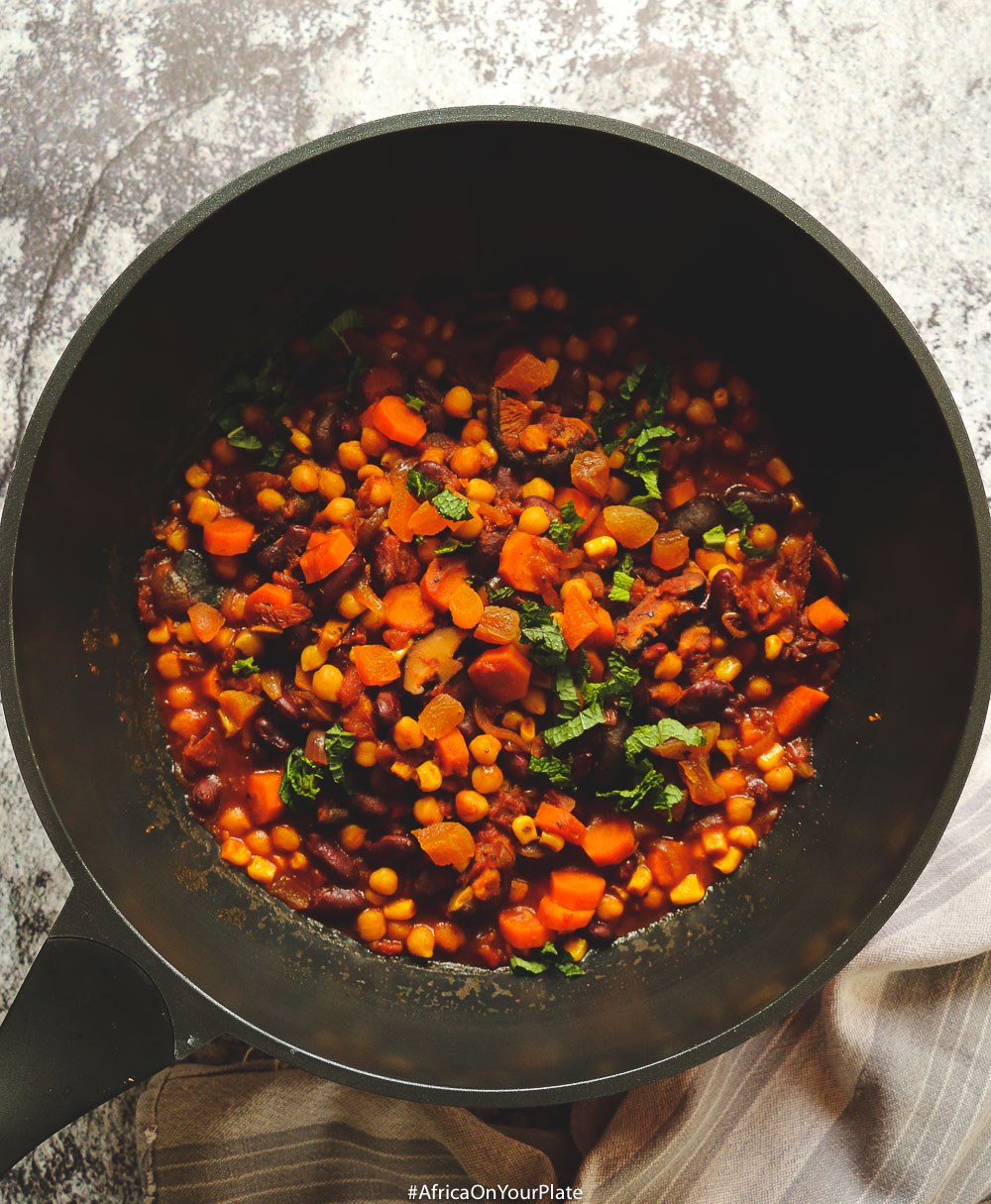 This vegan chili recipe is hearty, and filling. With a mix of chickpeas (garbanzo beans), beans, sweet corn, and Ethiopian spices, this vegan African chili is easy to make, bursting with flavours and nutrients and a secret umami ingredient.