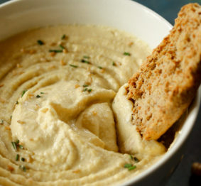In this post, I share the secret to making the most awesome hummus dip, from an Algerian recipe. This Algerian Hummus recipe delivers the most silky smooth and creamy hummus dip.