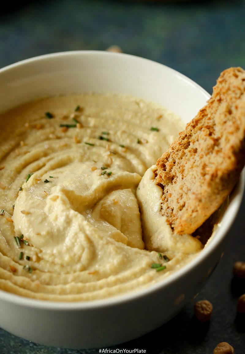 In this post, I share the secret to making the most awesome hummus dip, from an Algerian recipe. This Algerian Hummus recipe delivers the most silky smooth and creamy hummus dip.