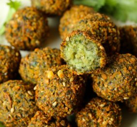 This Moroccan-inspired falafel recipe delivers a delicately crispy falafel on the outside with a soft buttery interior. Herbed and spiced to perfection, they are super easy to make. Eat them on their own, or in a falafel salad or as a snack.